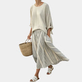 Aurora | Comfortable blouse and striped midi skirt