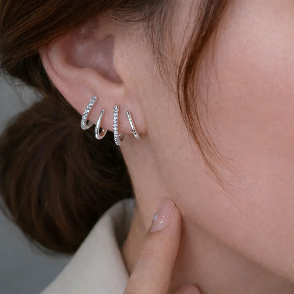 Yasmin | Claw-style earrings with zircons
