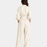 Cybèle | Elegant long-sleeved jumpsuit with belt
