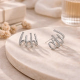 Yasmin | Claw-style earrings with zircons