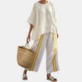 Arianna | Elegant top with yellow stripes and wide-leg pants